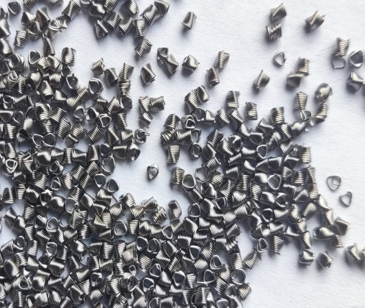 Triangular spiral packing